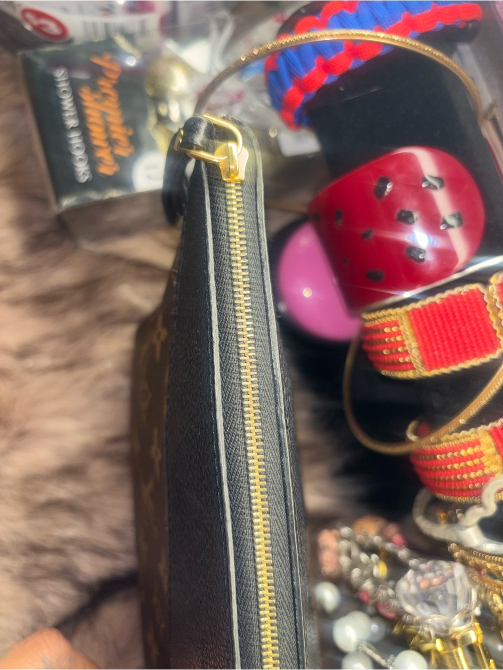 Louis Vuitton Monogram Black Wristlet with Gold Hardware
